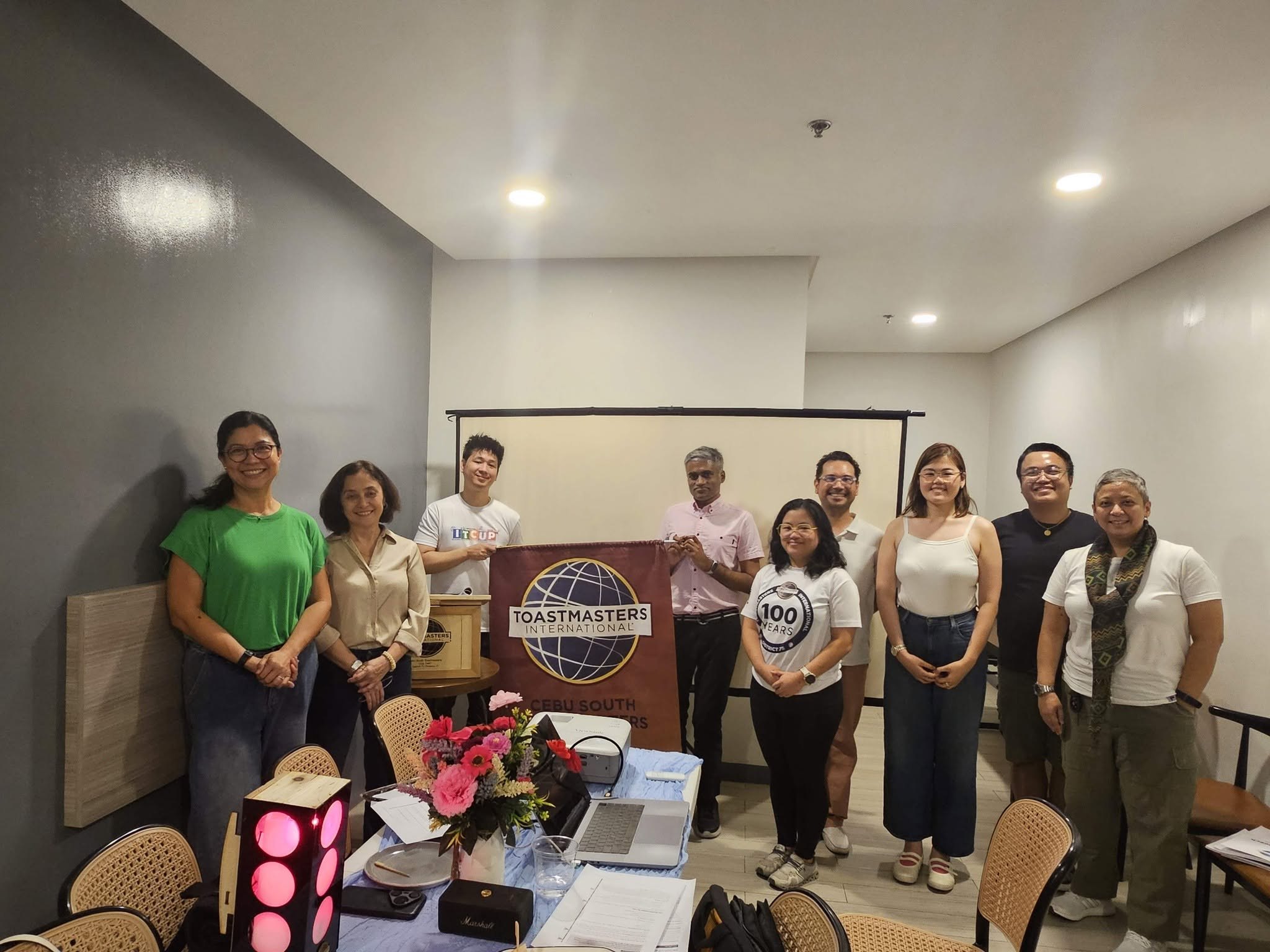 The Cebu South Toastmasters Club gathered beneath the Toastmasters International banner