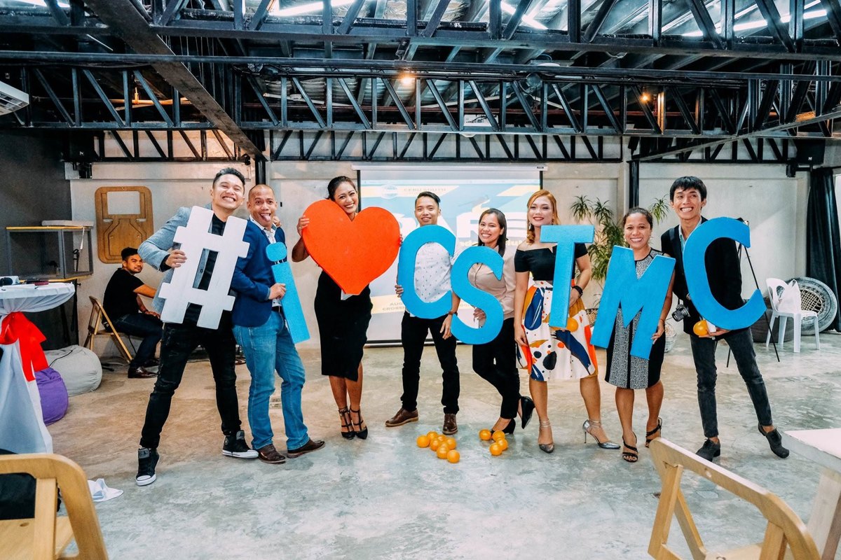 Cebu South Toastmasters Club members holding I love CSTMC letters